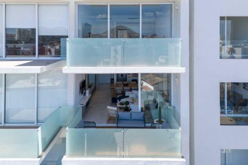 a view of the living room from the balcony of a house at New 3BR in the Heart of San Lucas in Cabo San Lucas
