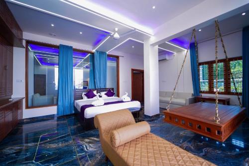 Postel nebo postele na pokoji v ubytování Skylar Seaview Beach Resort & Ayurveda Varkala