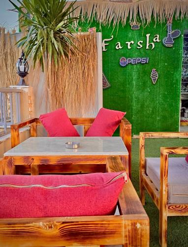 Zona de estar de Farsha Pyramids Inn