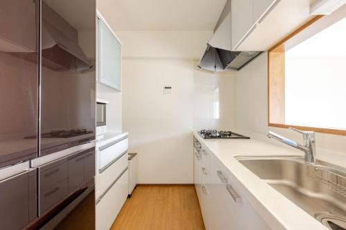 Η κουζίνα ή μικρή κουζίνα στο Jintai House401
