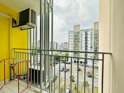 a balcony with a view of a parking lot at setia alam islamic homestay in Shah Alam