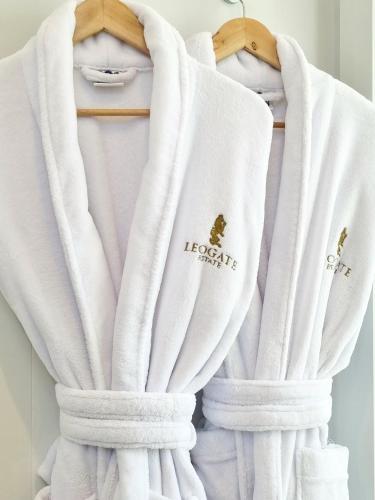 a white scarf hanging on a rack at Leogate Estate Villas in Pokolbin