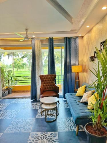 Posezení v ubytování Bluebell Meadows 2BHK