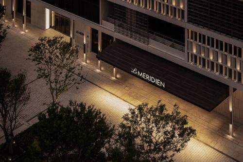 a building with a bench in front of it at night at Le Meridien Hualien Resort in Hualien City
