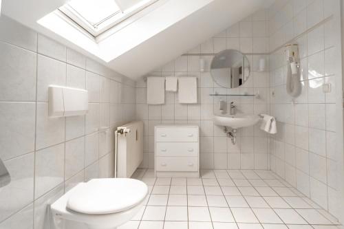 Koupelna v ubytování Appart-Haus Business Apartments