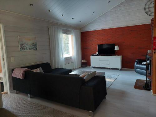 TV a/nebo společenská místnost v ubytování Villa Wältti