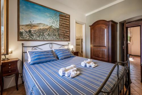 Letto o letti in una camera di Le Stanze della Terrazza sul Borgo