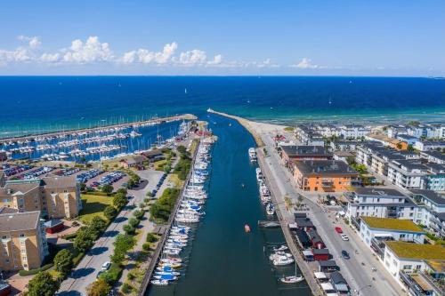 an aerial view of a marina with boats in the water at Lomma Station Inn Loft in Lomma