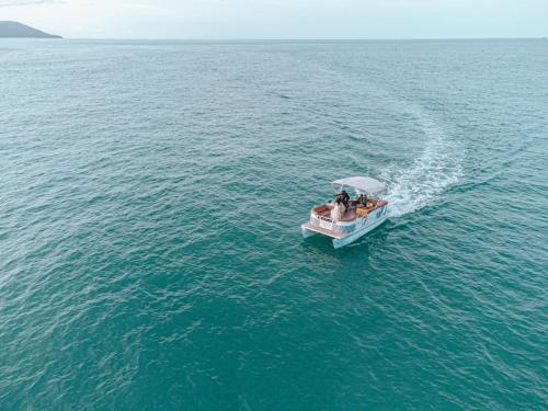 a group of people on a boat in the water at Sichon Cabana Beach Resort in Sichon