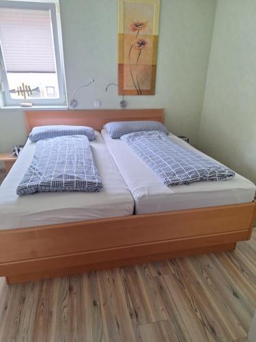 Ένα ή περισσότερα κρεβάτια σε δωμάτιο στο Am Ringwall 76