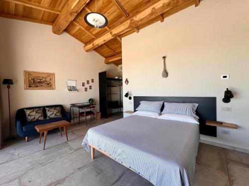 Postel nebo postele na pokoji v ubytování Podere l'Alfina B&B - Bio Agriturismo