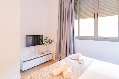 Postel nebo postele na pokoji v ubytování Feelathome Merced Apartments