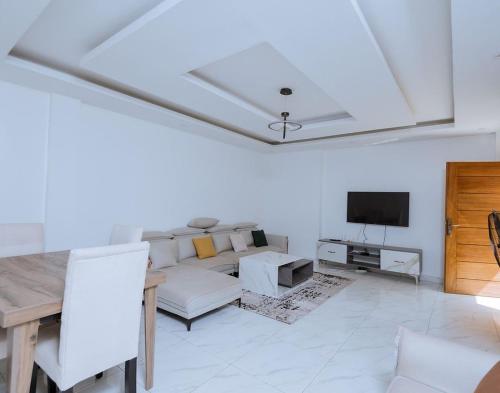 Μια τηλεόραση ή/και κέντρο ψυχαγωγίας στο COMFY Luxury Homes