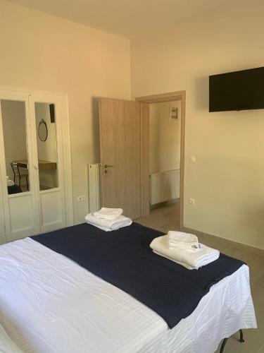 Katil atau katil-katil dalam bilik di Aeacus Serenity Apartment