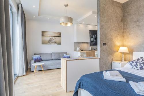 Posteľ alebo postele v izbe v ubytovaní Unique Apartments - Browar Gdański