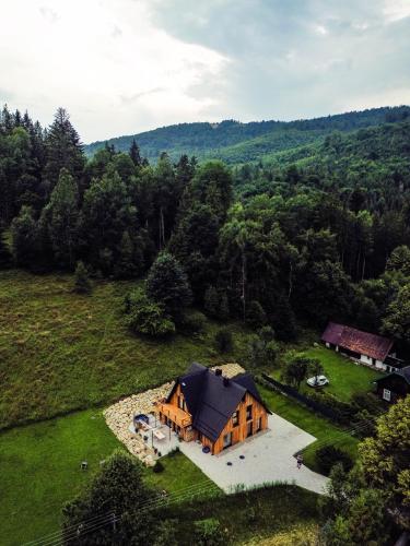 an overhead view of a large house in a field at Rycerki Dom na Szlaku in Rajcza