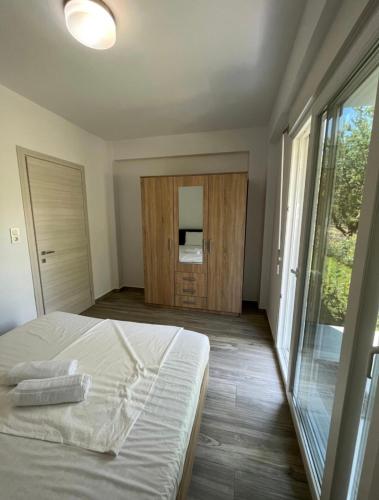 Postel nebo postele na pokoji v ubytování Palm Residential