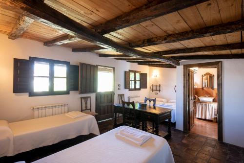 Postel nebo postele na pokoji v ubytování La Llosuca Rural