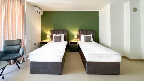 Ένα ή περισσότερα κρεβάτια σε δωμάτιο στο Studio Apartman Medonis