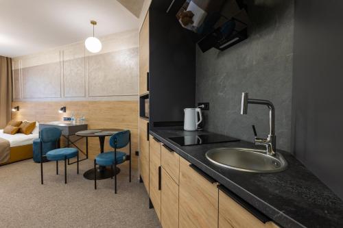 Kuchyň nebo kuchyňský kout v ubytování Jam Apartments Miskevycha