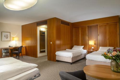 Postel nebo postele na pokoji v ubytování Maritim Hotel Stuttgart