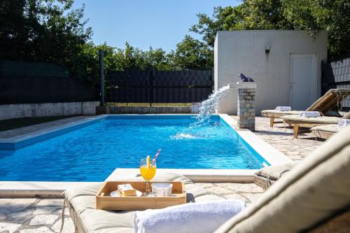 House Runjic with pool, large garden and playground