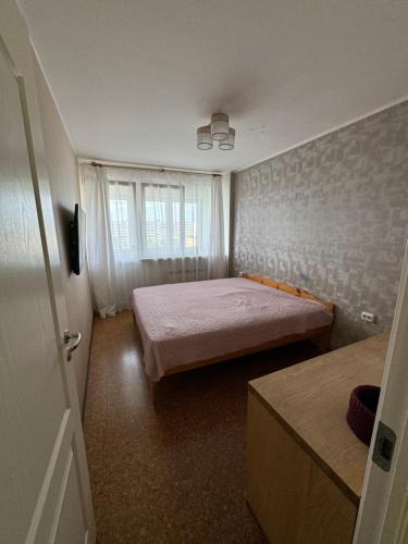 Postel nebo postele na pokoji v ubytování Tallinna mnt
