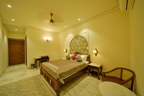 Postel nebo postele na pokoji v ubytování Dera Jaipur Homestay