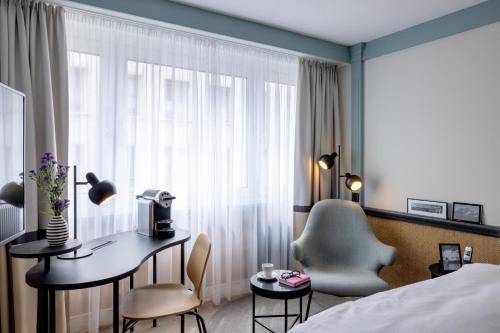 Postel nebo postele na pokoji v ubytování Hotel Luzernerhof