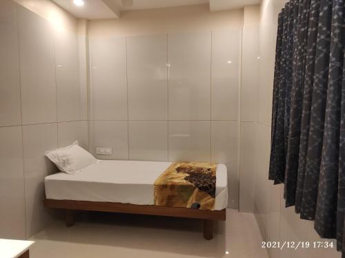 Quilon Residencyにあるベッド
