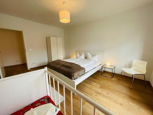Postel nebo postele na pokoji v ubytování Dill Apartment Pleinfeld am Brombachsee I