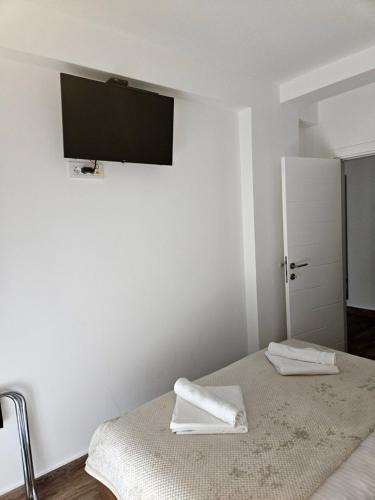 Postel nebo postele na pokoji v ubytování Apartman Svitanje