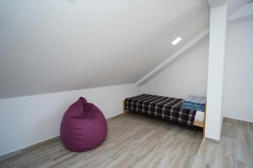 Postel nebo postele na pokoji v ubytování Apartmani Vujović