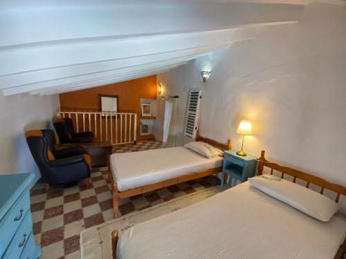 Ένα ή περισσότερα κρεβάτια σε δωμάτιο στο Casita de los Azulejos in Comares
