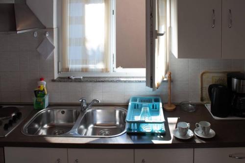 Kuchyň nebo kuchyňský kout v ubytování Comfort and affordable apartments Slavica