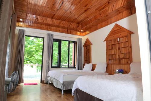 Ένα ή περισσότερα κρεβάτια σε δωμάτιο στο Restful River Bungalow