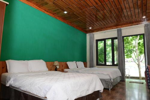 Ένα ή περισσότερα κρεβάτια σε δωμάτιο στο Restful River Bungalow