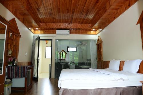 Ένα ή περισσότερα κρεβάτια σε δωμάτιο στο Restful River Bungalow