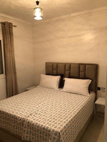 Postel nebo postele na pokoji v ubytování Appartement Rochd Val FLeuri