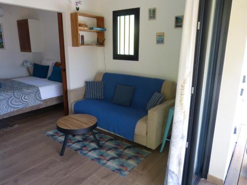 Ένα ή περισσότερα κρεβάτια σε δωμάτιο στο Bungalow Cosy Vétyver