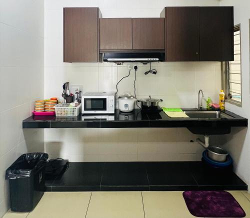 Η κουζίνα ή μικρή κουζίνα στο Peace Homestay