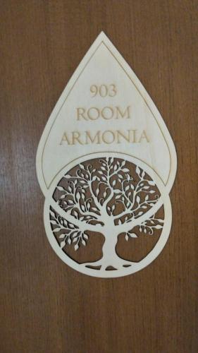 a sign with a tree on it on a table at Borgo Doccia 905 in Montese