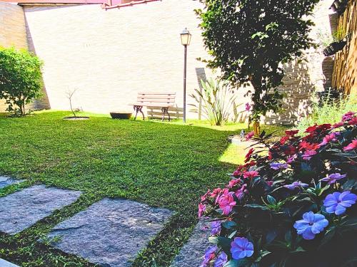 Jardín al aire libre en Casas M&G Penedo com vista para a serra