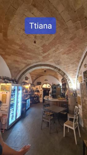 a tika sign on the ceiling of a store at Rocca Casa in Roccatederighi