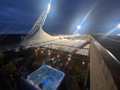 an overhead view of a building at night at Wellness Dome Penthouse Suite in Kerkrade