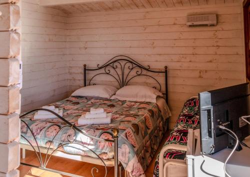 Кровать или кровати в номере Agriturismo Pinelli