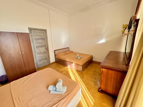 Giường trong phòng chung tại Ararat Guest House