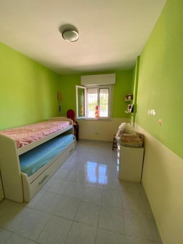 Ένα ή περισσότερα κρεβάτια σε δωμάτιο στο villavillachiara