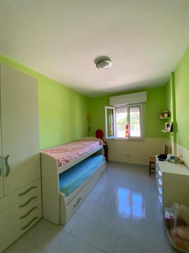 Ένα ή περισσότερα κρεβάτια σε δωμάτιο στο villavillachiara