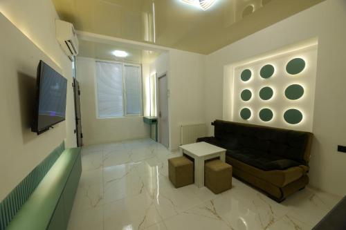 TV a/nebo společenská místnost v ubytování Apartment Pluse
